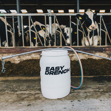 Easy Drench Budget from Easy Farming, a liquid fertilizer product with a measuring container and application tools.